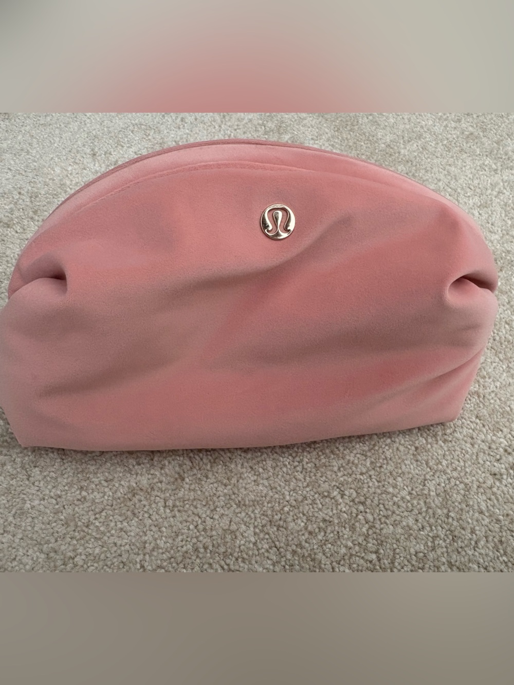 Lululemon Pink velvet cosmetic bag.